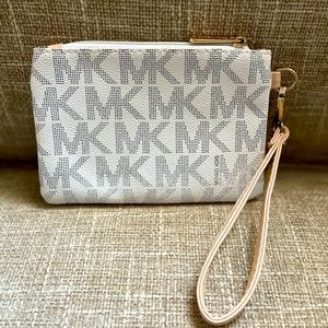 Michael Kors monogrammed Wristlet NWOT 7x5”